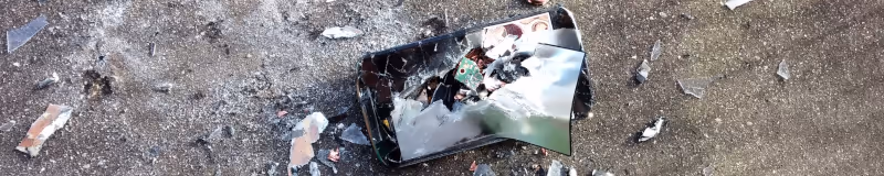 Photo of a smashed mobile phone.
